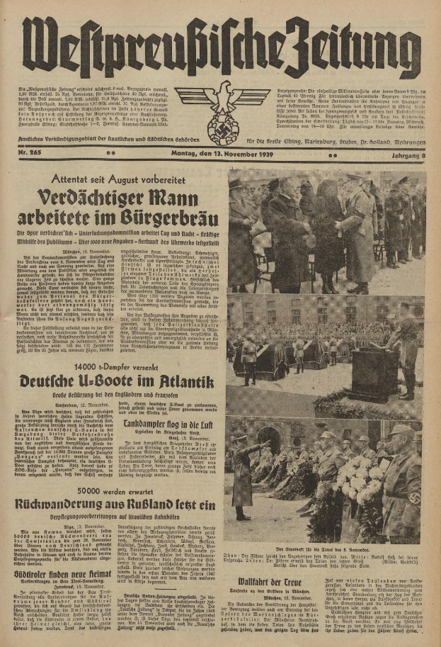 Alte Zeitungsvorderseite vom 13. November 1939, betitelt "Weitpreubliche Zeitung", mit einem Bild einer Gruppe von Menschen in traditioneller deutscher Kleidung, die feierlich wirkt.