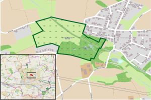 Ein detaillierter Stadtplan von Gewinghausen, Deutschland, der einen grünen Bereich hervorhebt, der den vorgeschlagenen Standort angibt, mit sichtbaren Straßen, Gebäuden und Sehenswürdigkeiten.