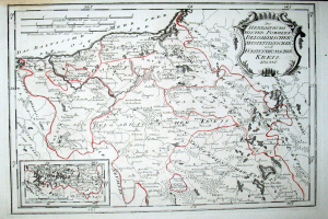 Alte Deutschlandkarte mit einer roten Linie darauf, auf Papier gedruckt mit handgeschriebener Text.