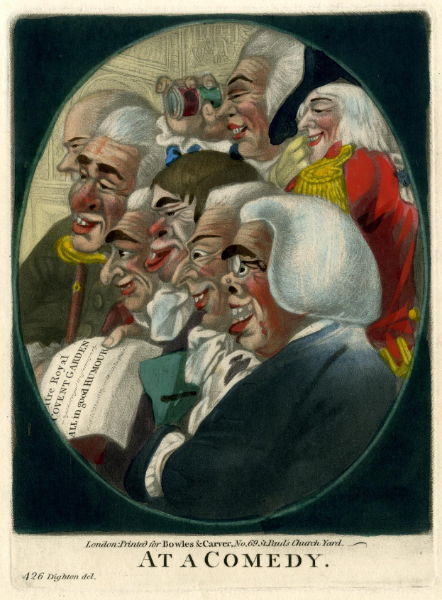 Eine Gruppe von Menschen, die in einem Kreis bei einem Comedy-Event lachen, wobei eine Person ein Blatt Papier hält.