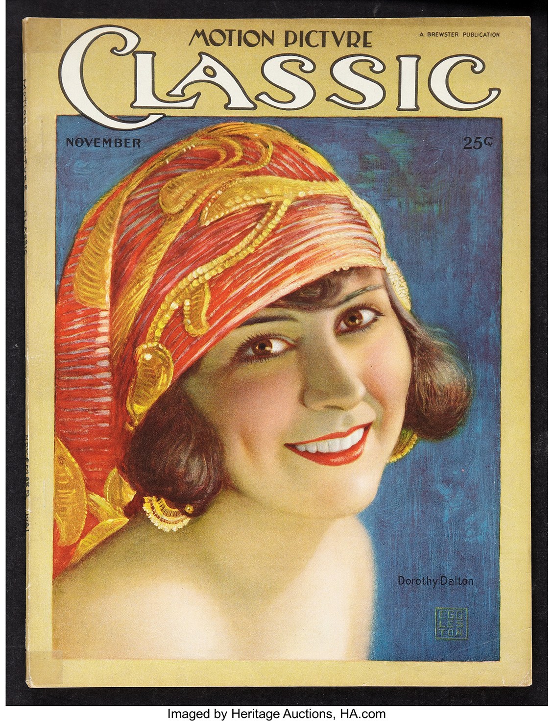 Eine Frau mit rotem Turban lächelt auf dem Cover eines 'Motion Picture Classic'-Magazins.